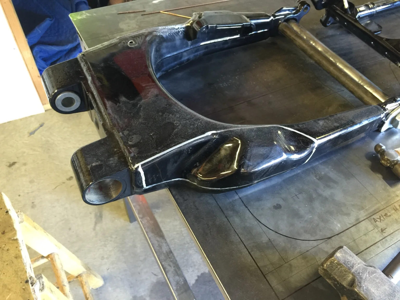 Modified Harley swingarm with welded clearance section