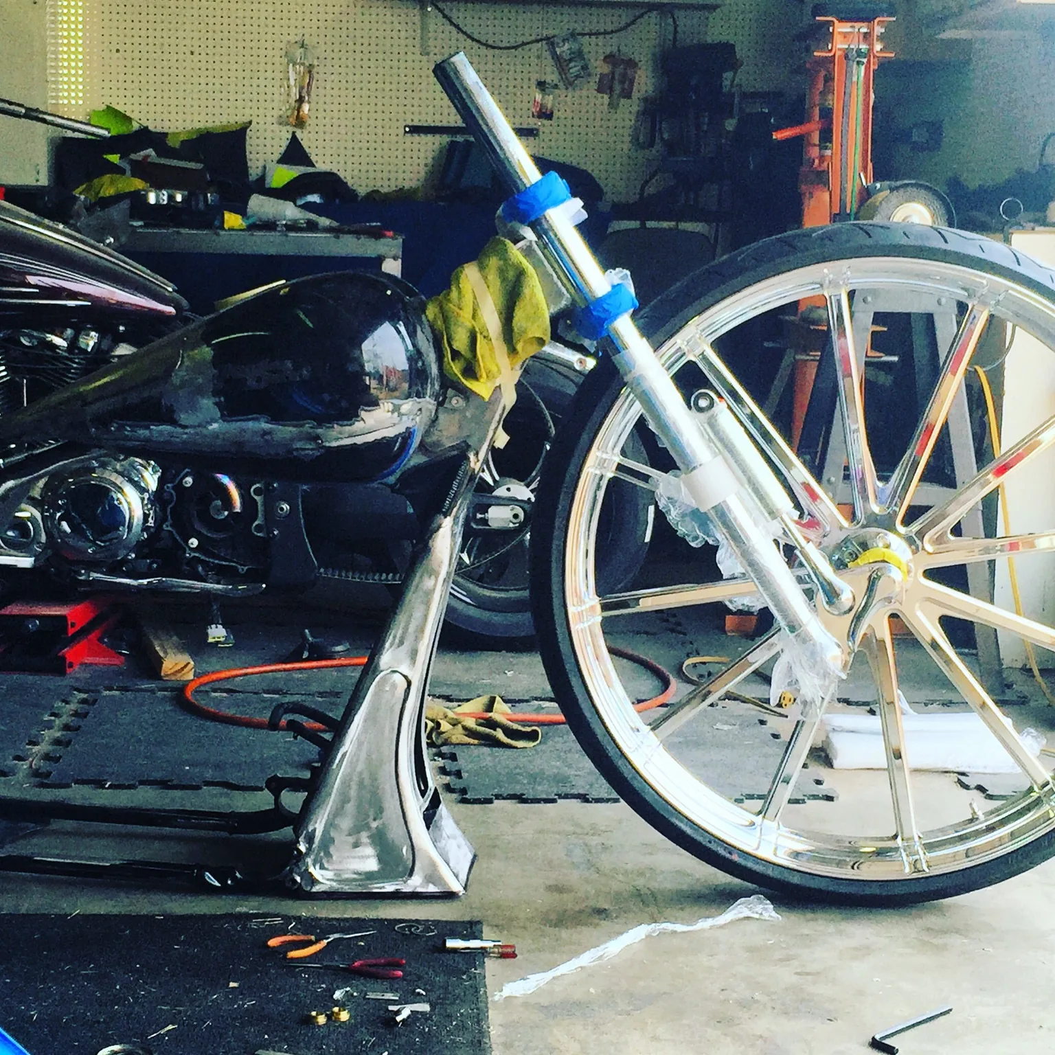 Custom chin spoiler fitted to raked Harley with 32 inch wheel