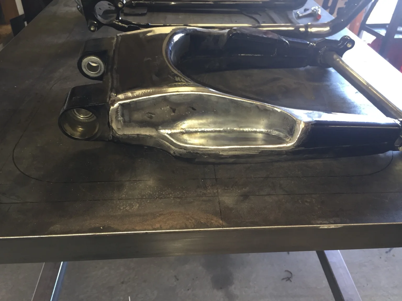 Harley swingarm marked for air ride clearance